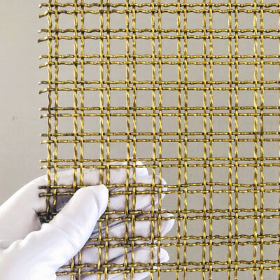 Malha Arquitetônica de Arame Enrolado Dourado com Células de Diamante Abertas